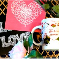 Love-themed postcards and a mug