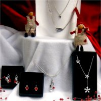 Different styles of silver necklaces and earrings
