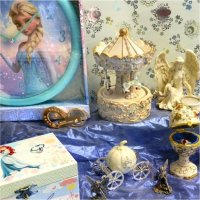Different styles of jewelry boxes, music boxes, fairies, and a clock, a jewelry stand, and other gift products