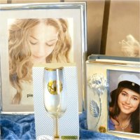 Graduation-themed drinking glasses, a photo album and a photo frame